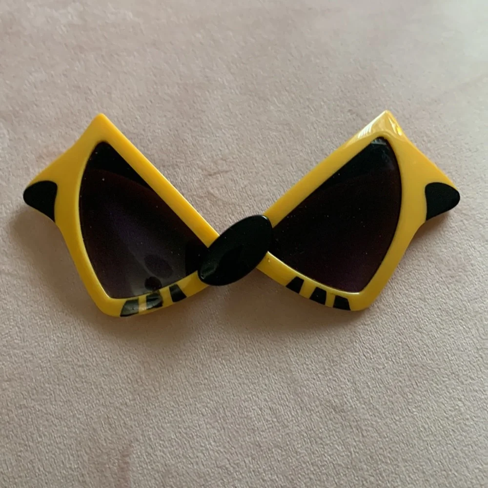 Kids Raccoon sun glasses. Free with any kid/ Toddler purchase.